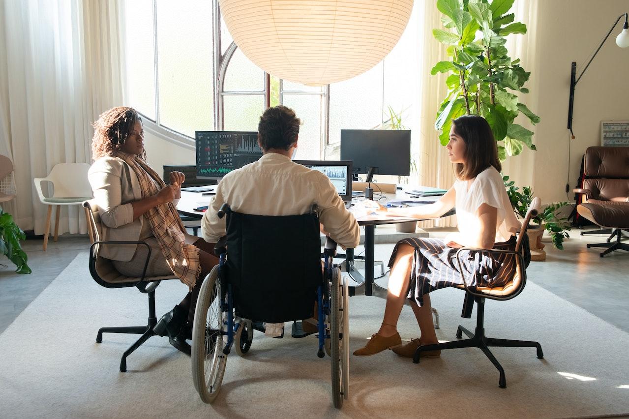 coworkers in a meeting - diversity and inclusion D&I