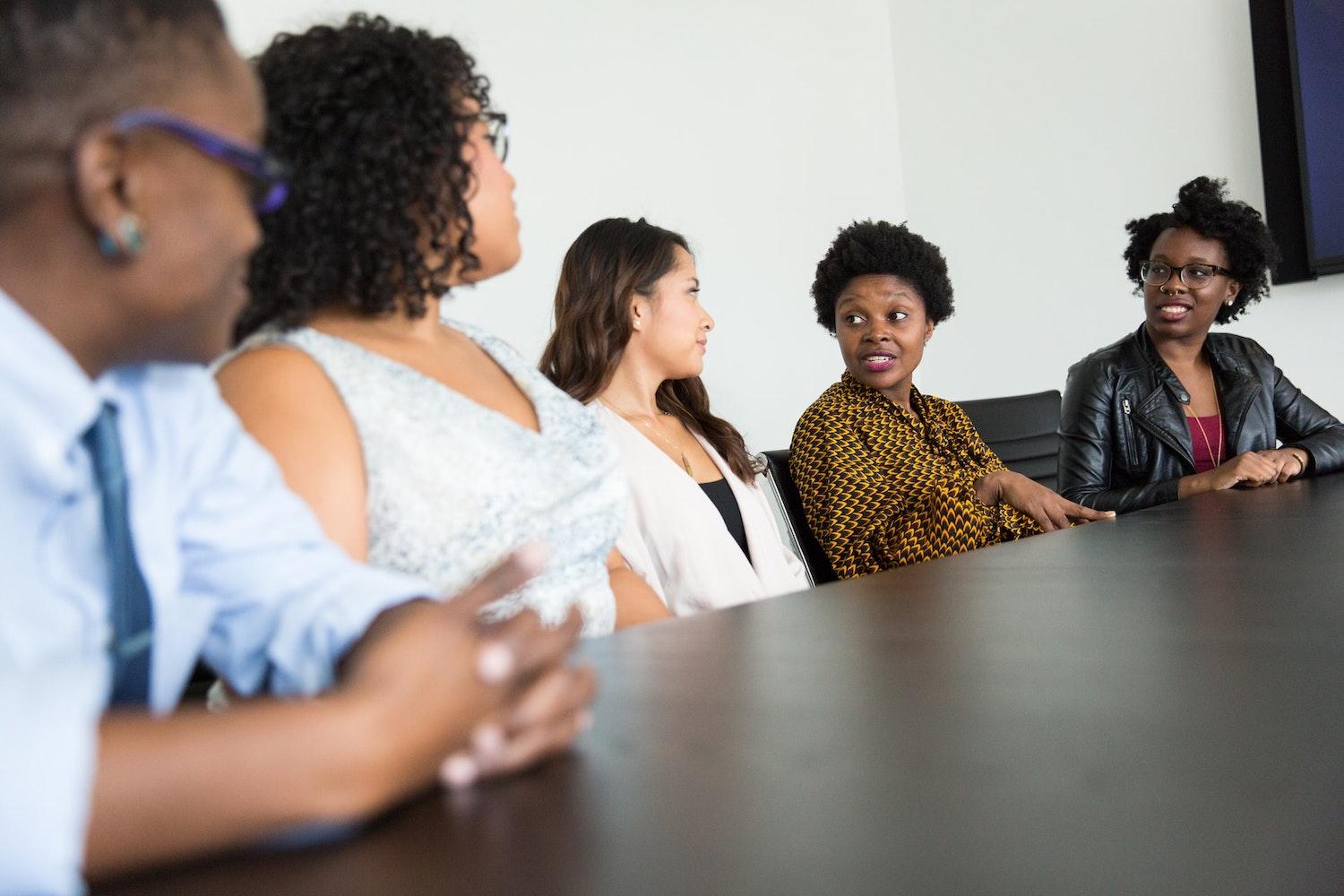 Coworkers meeting - total rewards strategy and diverse workforce
