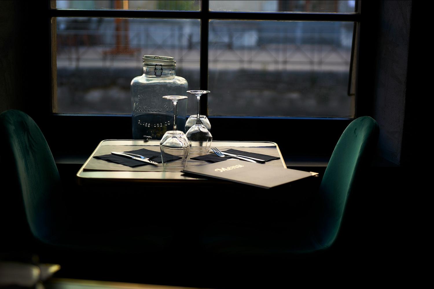 A menu on a table at a restaurant — restaurant sustainability 